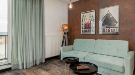 W cieniu stoczniowych żurawi